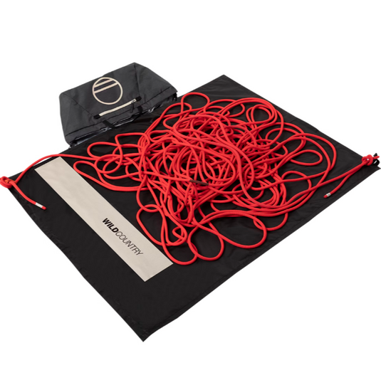 Wild Country Rope Bag in ONYX with red rope laid on intergrated rope tarp