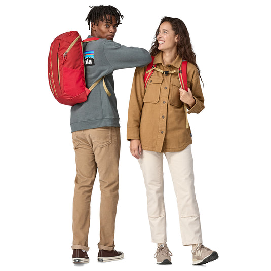 Patagonia Black Hole Pack 25L worn by two models