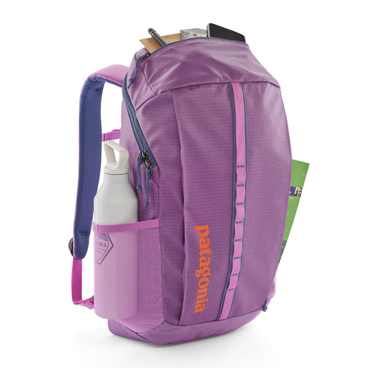 Patagonia Black Hole Pack 25L shown with items in pockets