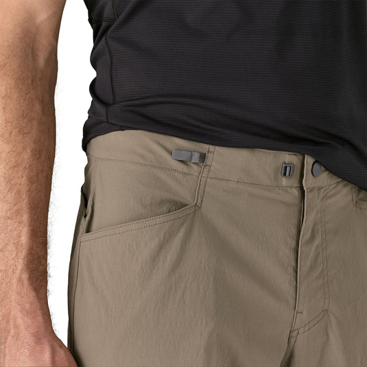 Patagonia Mens RPS Rock Pants in wing grey worn by model close up of waist detail