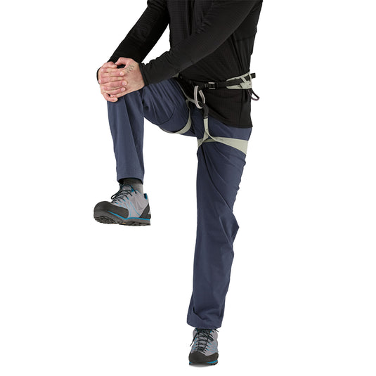Patagonia Venga Rock Pants Smoulder Blue worn by model in harness